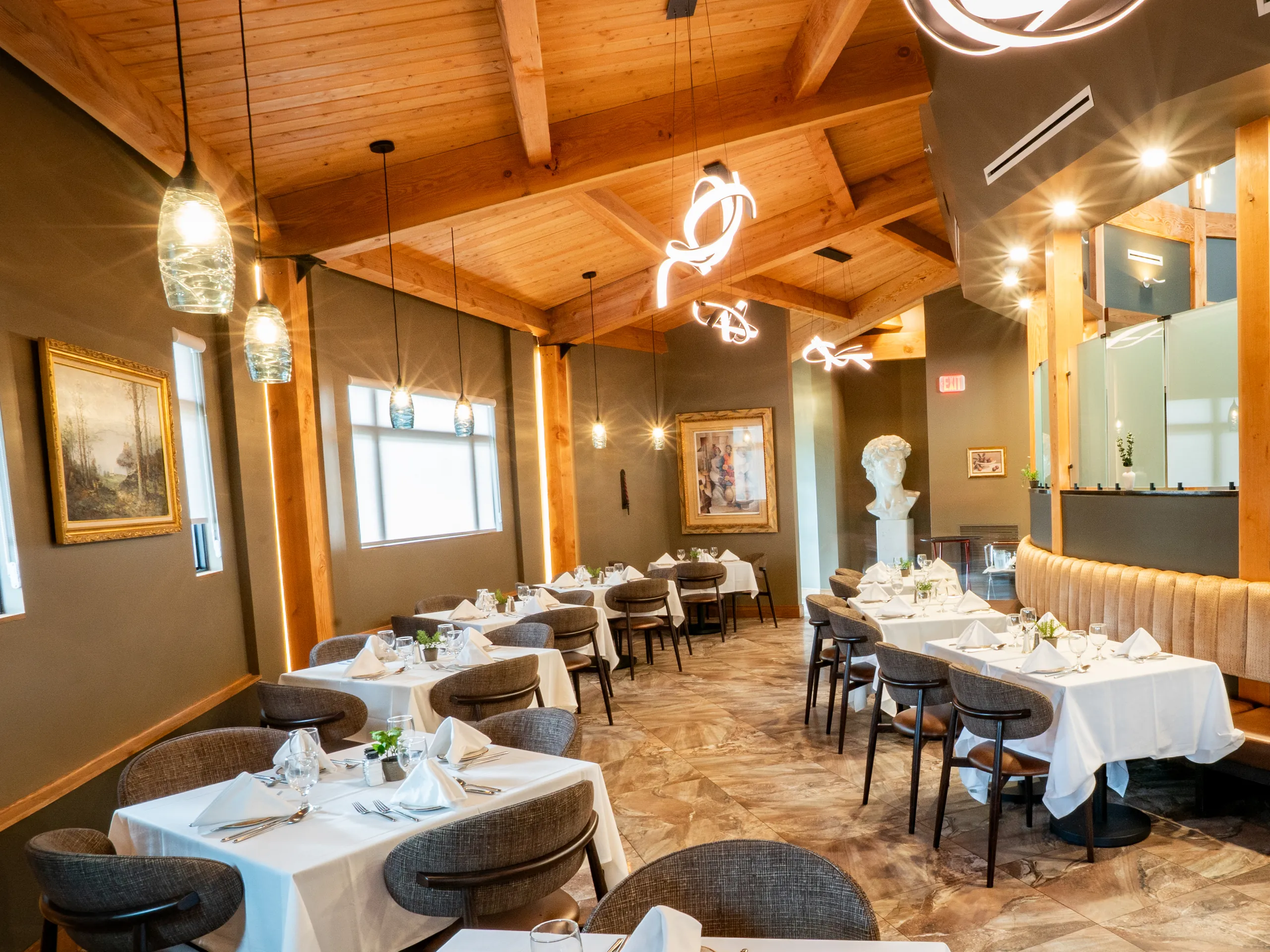 Joey's dining room with tables set in white linen