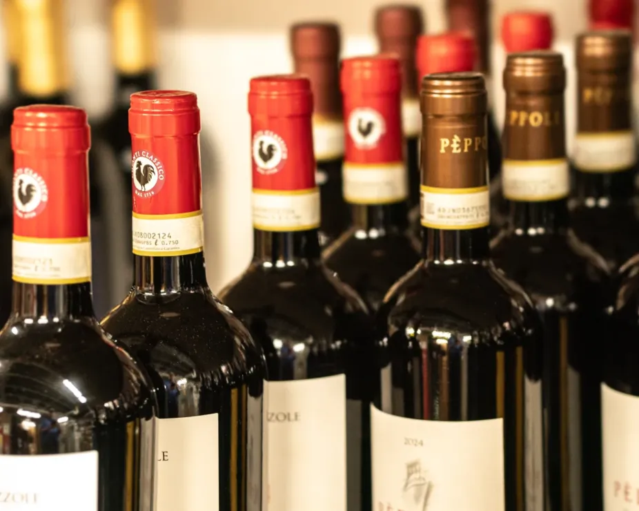 Bottles of Italian red wine lined up on the bar